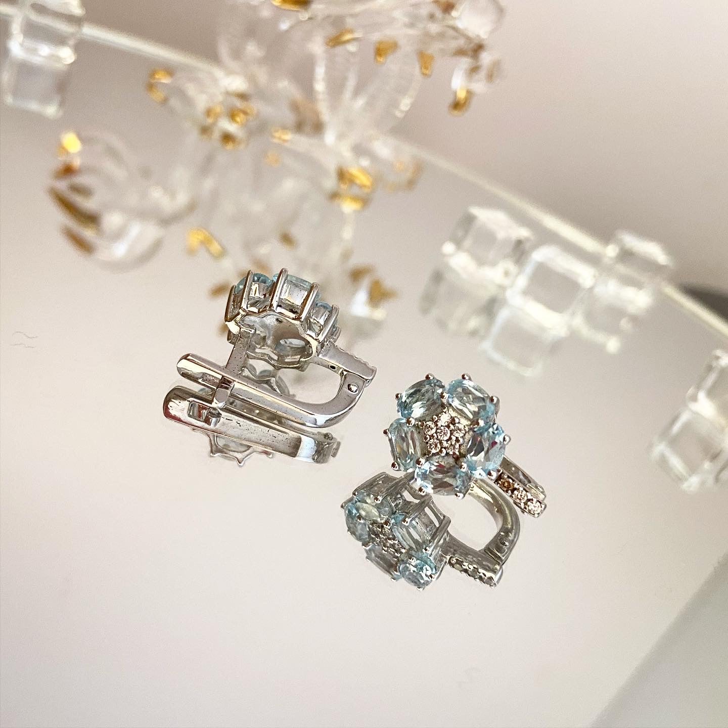 Earrings with topaz