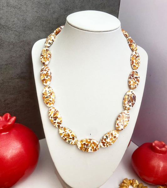 Necklace with amber "Dalmatian"