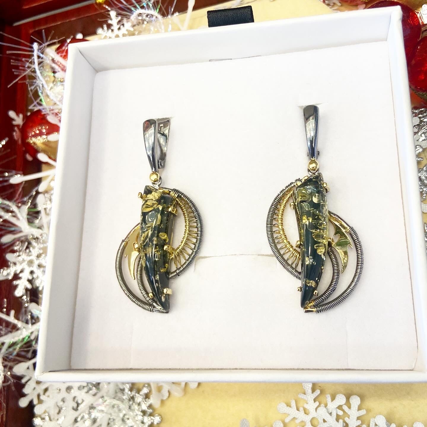 Handmade earrings with amber.