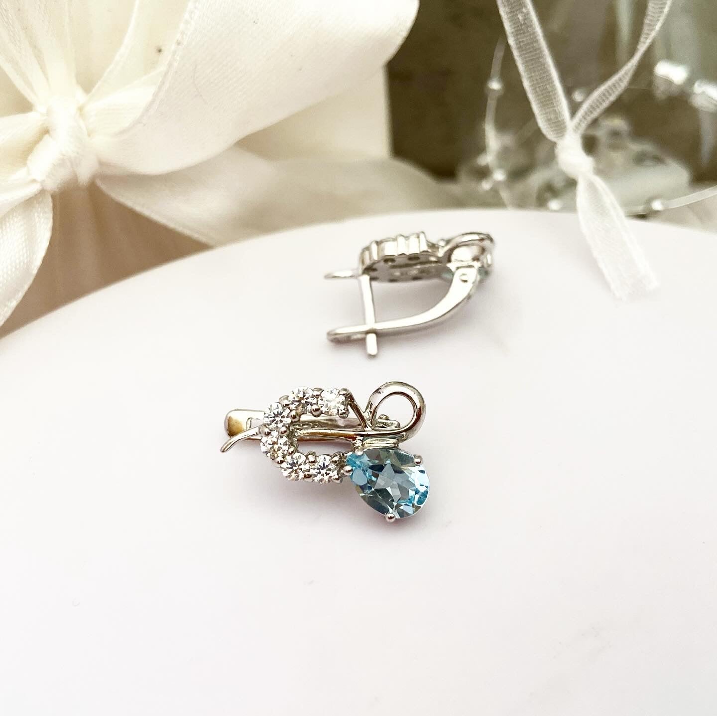 Elegant earrings adorned with Sky Blue Topaz