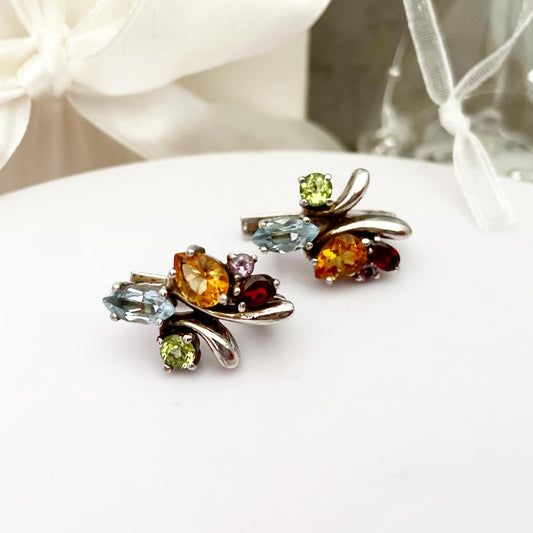 Earrings with bright gemstones