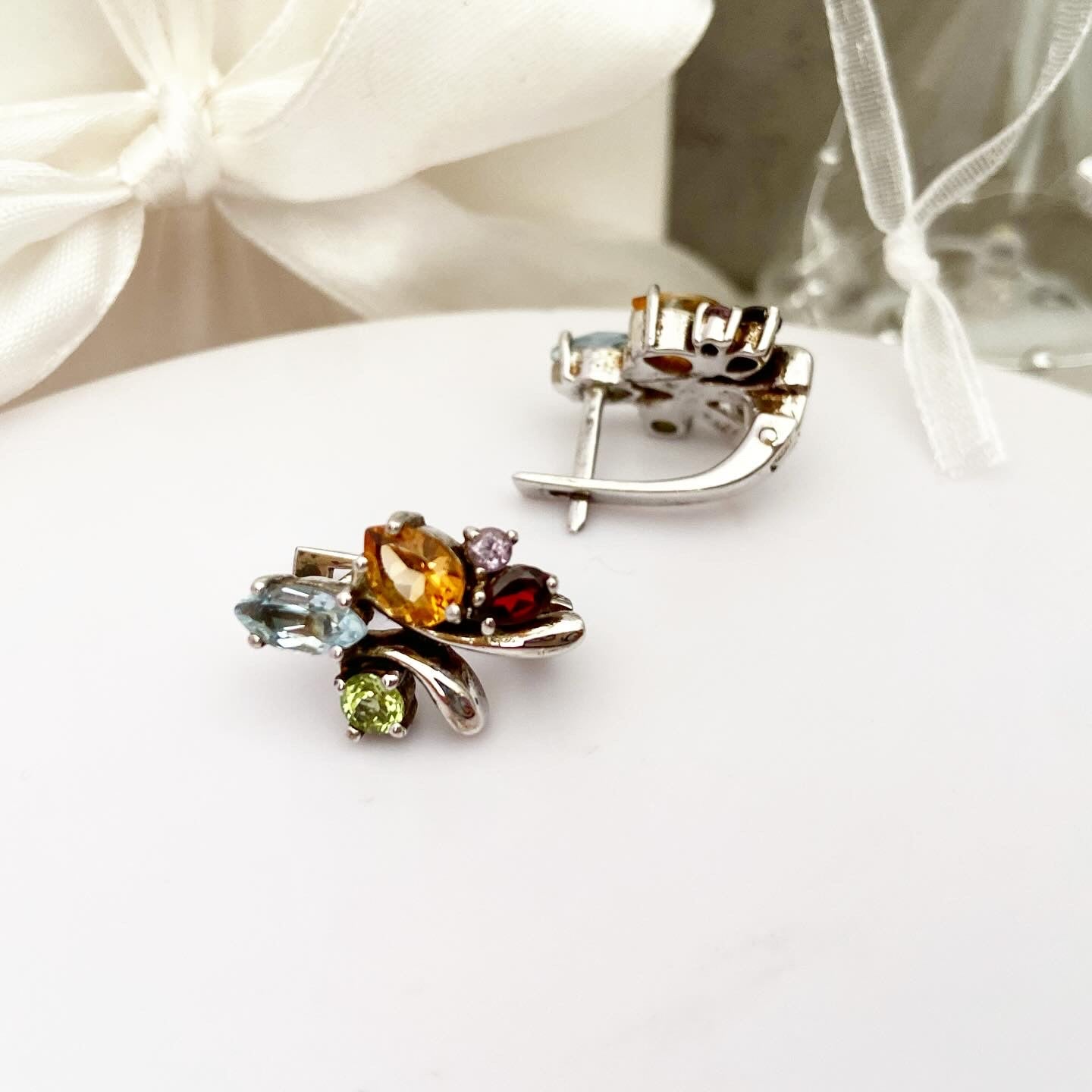 Earrings with bright gemstones