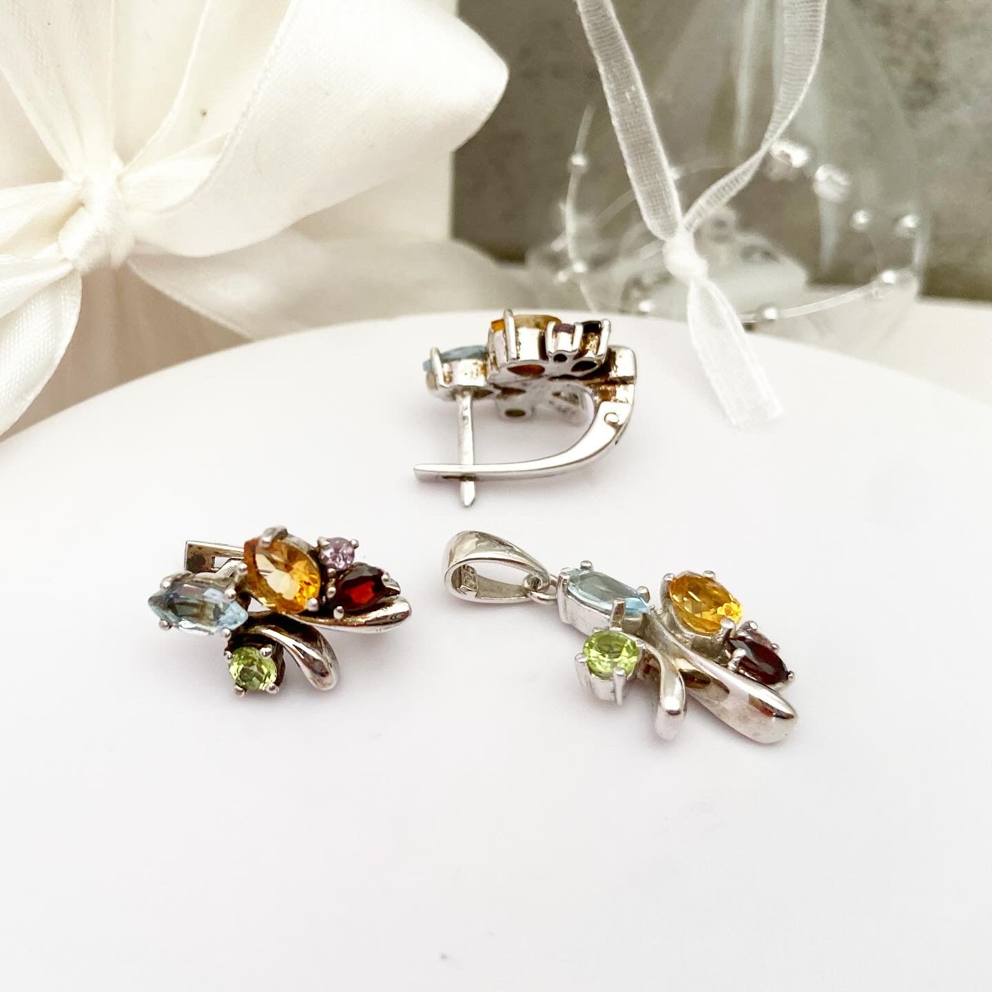 Earrings with bright gemstones