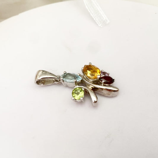 Pendant with bright gemstones