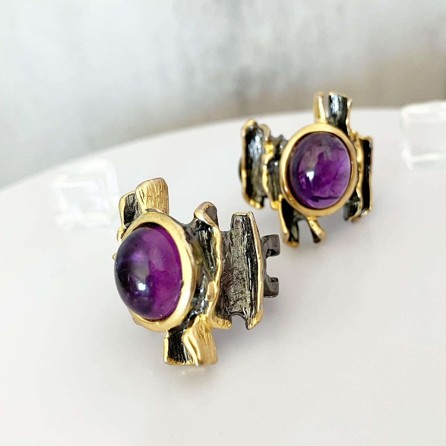 Earrings blackened silver 925 samples with partial gilding and amethyst.