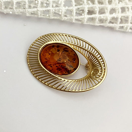 Brooch from silver with gilding and natural amber "Gloria"