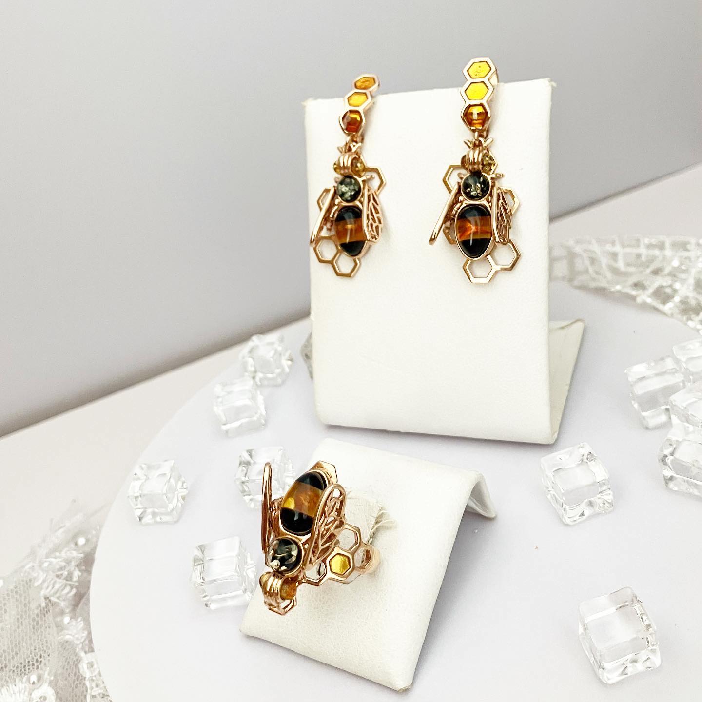 Set; earrings and ring made of silver with gilding and natural amber "Bee"