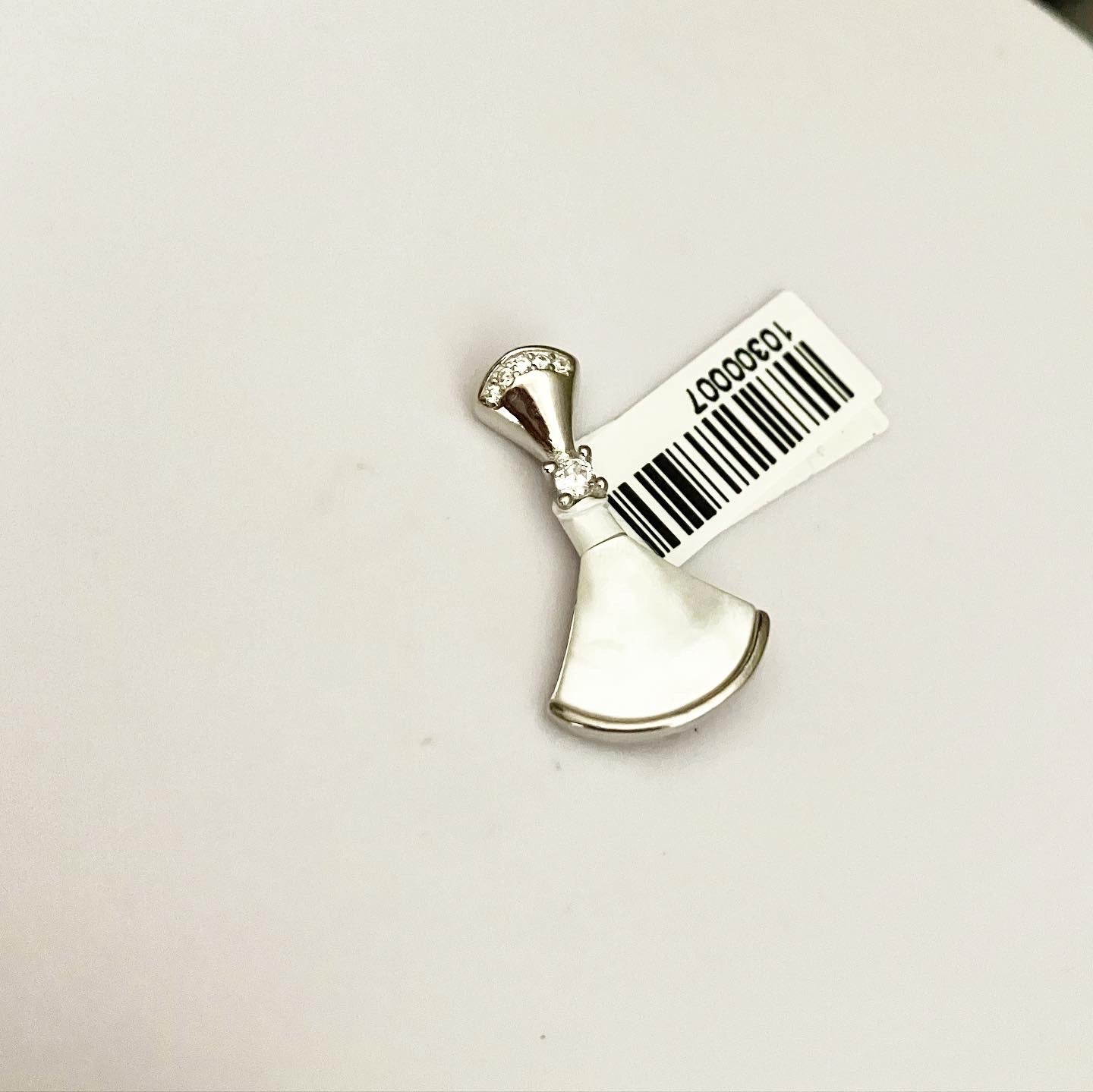 Pendant silver with enamel.