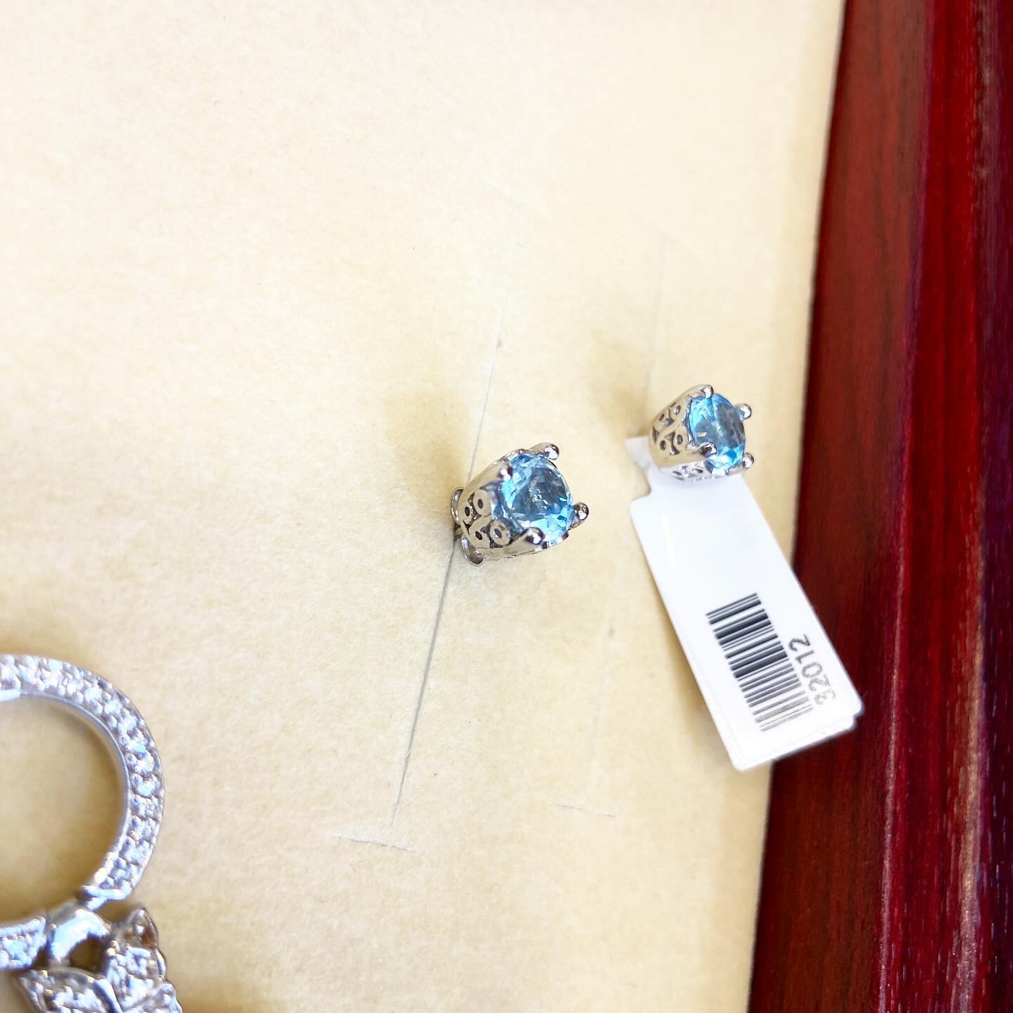 Stud earrings with topaz