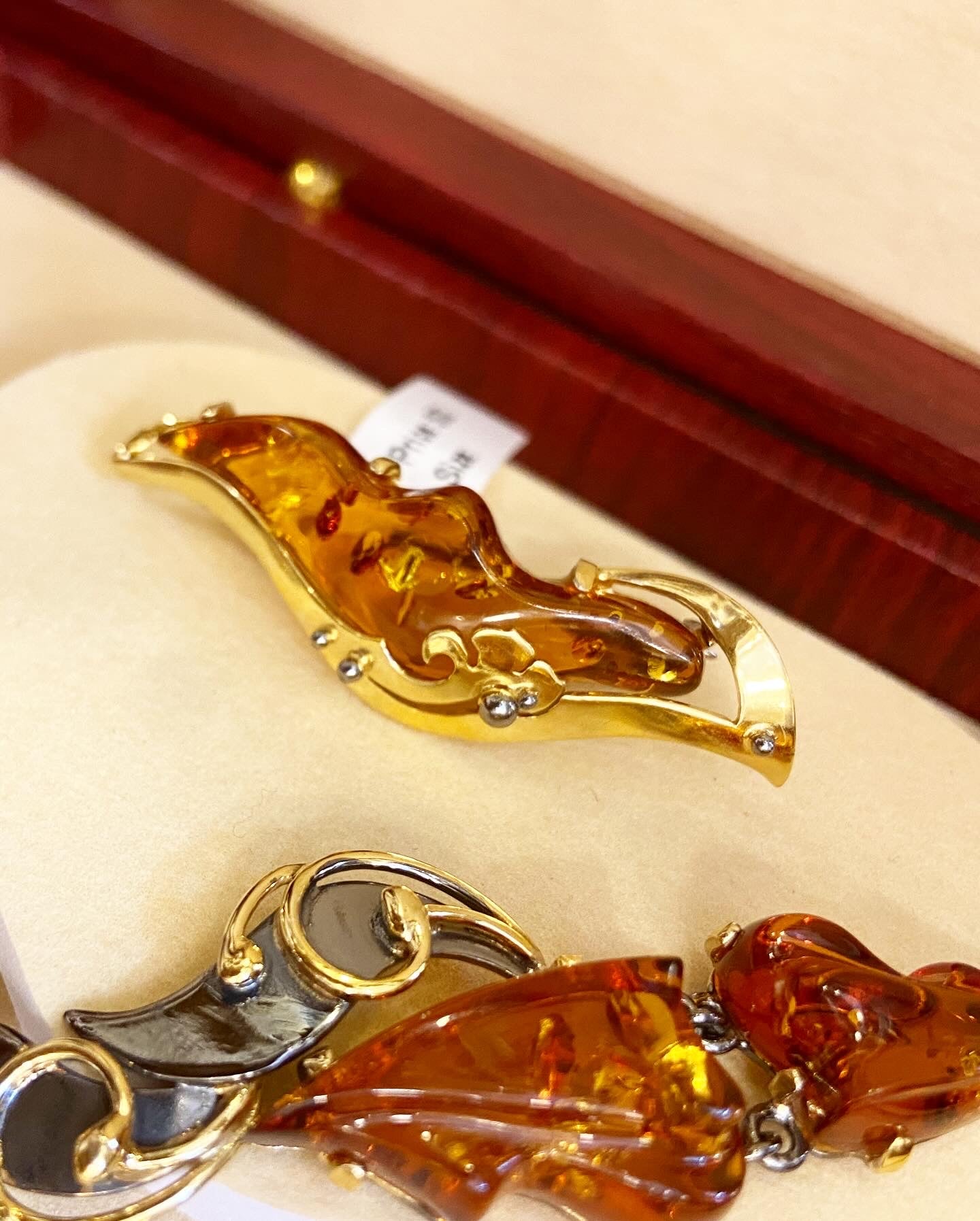 Handmade brooch with amber.