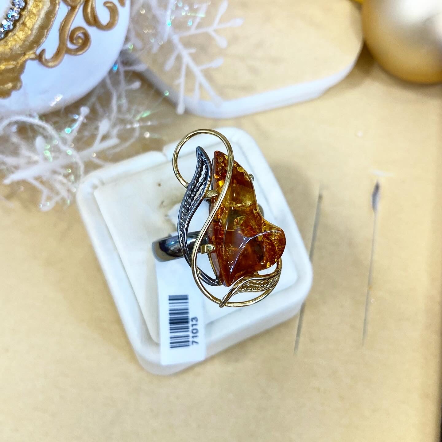 Handmade ring with amber.