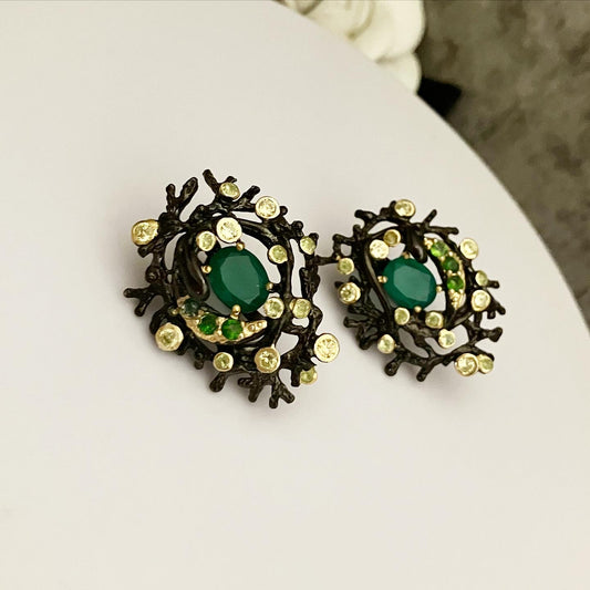 Earrings blackened silver with gilding with opal and zirconium.
