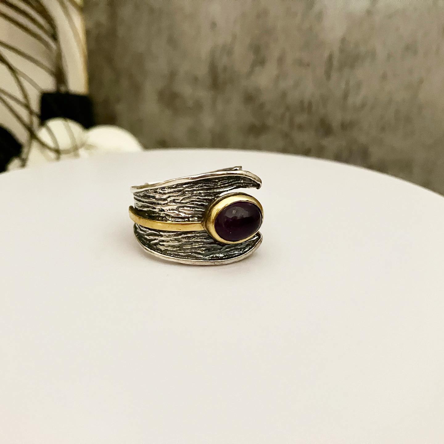 Ring blackened silver with partial gilding and amethyst.