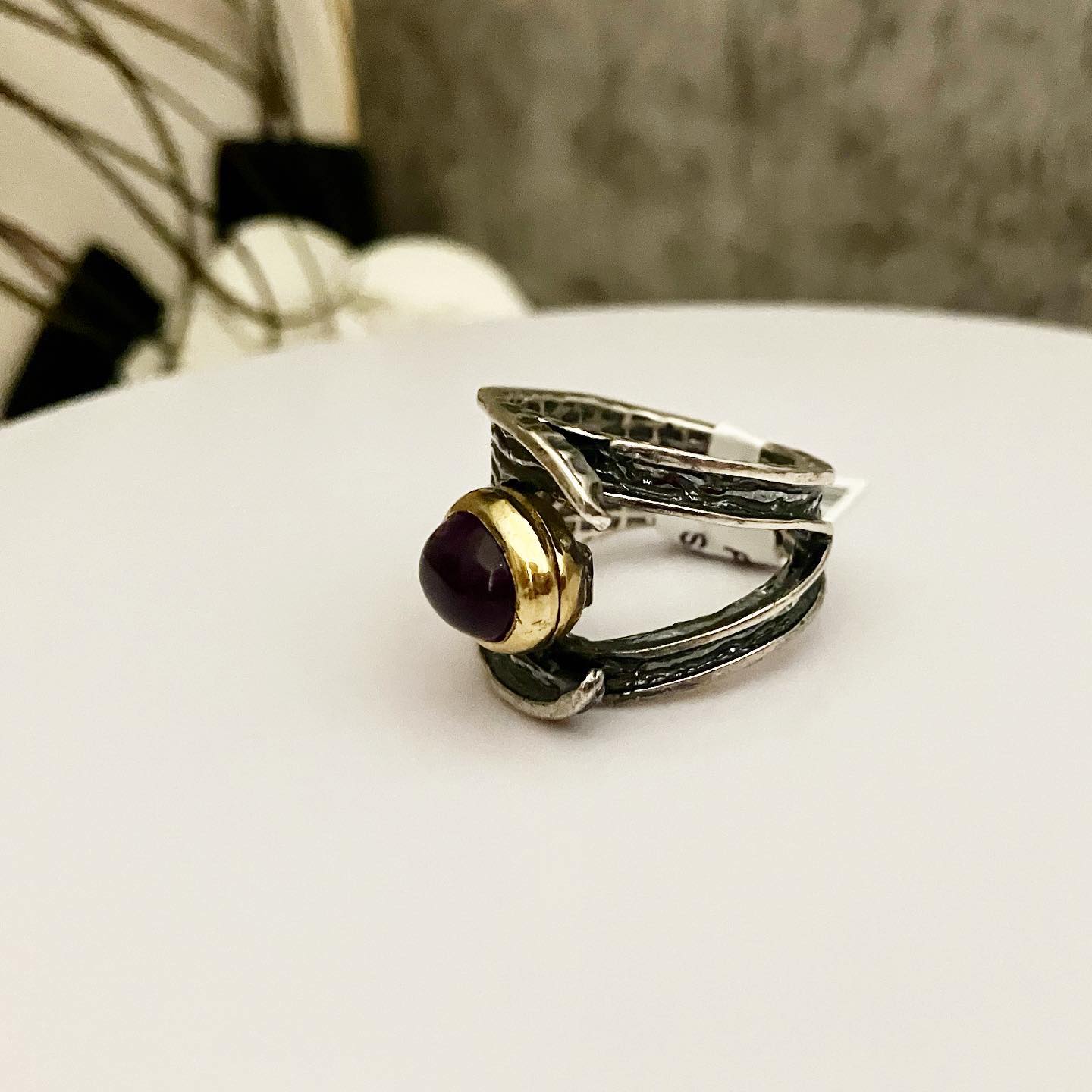 Ring blackened silver with partial gilding and amethyst.